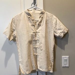 Linen shirt with bow buttons